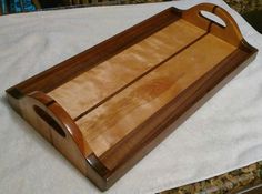 a wooden tray sitting on top of a table