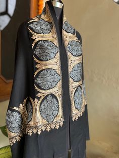 - Condition: Brand New - Style: Stole  Wrap - Fabric: 100% Fine Wool  - Embroidery: Hand-Embroidered Kashmir work  - Weave: Soft Weave - Color : black  - Embroidery Color :golden and grey  length:-81 approx width:-28 Care Instructions - Steam Ironing Recommended after every 2 wear to avoid pilling. - Dry Clean Only. - Store in a moist free or ventilated area. Elegant Embroidered Festive Pashmina Shawl, Formal Shawl With Intricate Embroidery, Elegant Embroidered Pashmina Shawl For Festivals, Elegant Embroidered Pashmina Shawl For Festive Occasions, Traditional Formal Pashmina Shawl, Elegant Black Ceremonial Dupatta, Traditional Formal Shawl With Intricate Embroidery, Formal Festive Embroidered Shawl, Elegant Traditional Wear With Multicolor Embroidery