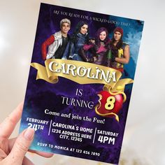 a person holding up a card for an upcoming show called gargonia is turning 8