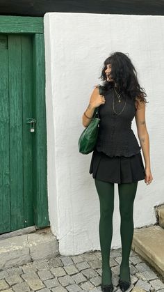 green thighs, bag and door i like iiiit Romper Tights Outfit, Green Tights Outfit Aesthetic, Olive Green Tights Outfit, Rule Of 7 Outfits, Emerald Green And Black Outfit, Green Stockings Outfit, Tights Aesthetic Outfits, Plaid Green Skirt Outfit, Outfits With Tights Aesthetic