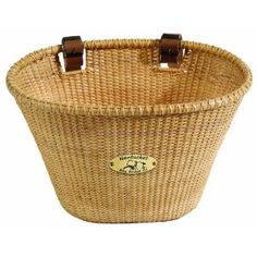 a small wicker basket with two handles on the front and back ends, for storage