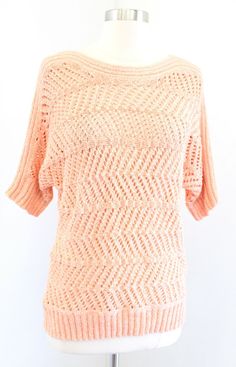 NWT Chicos Peach Orange Open Knit Crochet Pullover Sweater Top Size 1 NWT Chicos Peach Orange Open Knit Crochet Pullover Sweater Top Size 1 Size 1 Pit to pit: 19", dolman style underarm Top of shoulder to bottom hem: 25" New with tags, unworn. **The inner chico's tag has come unsewn on one side as shown. (ID:E5) Crochet Pullover Sweater, Peach Sweater, Crochet Pullover, Peach Orange, Open Knit, Pullover Sweater, Sweater Outfits, Pullover Sweaters, Sweater Top