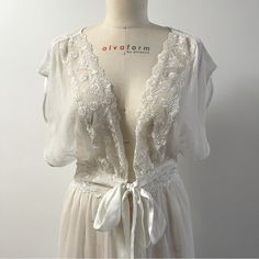 Rare Britney Spears Brand Night Gown / Dress, Never Worn. 100% Nylon, No Size Label. White V-neck Robe For Sleep, White V-neck Nightgown With Delicate Lace, White V-neck Night Dress, V-neck Lace Trim Robe For Daywear, White Sheer Fitted Nightgown, Fitted Sheer White Nightgown, Sheer Summer Nightgown For Wedding Night, White Lace Loungewear Dress, Sheer Nightgown For Wedding Night In Summer