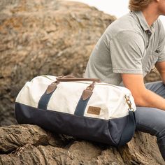 Sea Bags Recycled Sail Cloth Chebeague Island Duffel Navy - Conveniently sized to fit all airline carry on requirements, the Sea Bags Chebeague Island Duffel is ready to accompany you anywhere. Designed with premium leather handles, a waxed canvas bottom and recycled sail cloth, the accents are what take this bag from casual to luxurious. With an industrial zipper for closure and a detachable navy shoulder strap, this bag is designed for hand or shoulder carry. Spot clean only. Handmade in Portl Best Handmade Gifts, Sail Cloth, Recycled Sailcloth, Mens Weekend Bag, Sail Bag, Sea Bags, Leather Briefcase Men, Holiday Bag, Mens Travel Bag