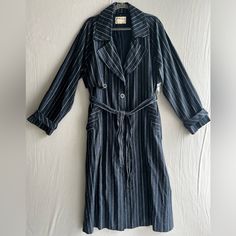 Free People We The Free Melia Mac Pinstripe Duster Trench Coat Size M Navy And White Pinstripes Linen Cotton Blend Midway Button Front Ankle Duster Length Notch Collar Front Pockets Strap Button Cuff Detail Oversized Slouchy Fit Matching Tie Waist Belt Extra Buttons Unlined New Without Tags Armpit To Armpit 24.5”-25” Length Shoulder To Hem 50” Linen Duster, Cuff Detail, Notch Collar, Trench Coats Women, Waist Belt, Navy And White, Trench Coat, Free People, Cotton Blend