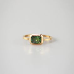 Featuring with a square vivid green gemstone, the Square Emerald Ring will be a beautiful yet elegant addition to your whole look. The clean design and beautiful green color makes the ring a everyday have-to-wear piece. 18k gold plated Stainless steel base Waterproof and tarnish free Available in US size 6-8 Ring sizin Square Emerald Ring, Emerald Ring Design, Jewelry Lookbook, Stone Pendant Necklace, Emerald Stone, Green Gemstones, Red Garnet, Emerald Ring, Stone Pendant