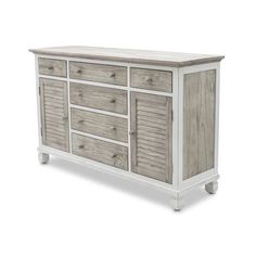 a white and grey dresser with drawers on it's sides, against a white background