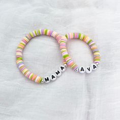 "Mama and Mini Bracelet Set.  Matching with your little one is always fun! 🎁 USA Free shipping 🎁 For extra Mama Bracelet, shop here: https://www.etsy.com/listing/1398740673/mama-bracelet-gift-for-mom-custom-name For extra Mini(Kid) Bracelet, shop here: https://www.etsy.com/listing/1457268942/disney-bracelet-for-little-girl-gift-for Adorable bracelet set for you and your little mini! This listing is for a set of Mama & Mini personalized stretchy heishi bracelet with your choice of eye-catching heishi beads! You can personalize it to whatever you'd like (Mommy, Mom, Mama or you and your child's name, etc). These are the Perfect item to Treat yourself, Friend or a Mama to be. Please provide the following information in the personalization field: -Name/word you would like on each bracelet. - Personalized Pink Novelty Bracelets, Customizable Pink Fun Bracelets, Playful Personalized Bracelets For Mother's Day, Multicolor Personalized Friendship Bracelets For Mother's Day, Customized Pink Friendship Bracelets For Mother's Day, Adjustable Novelty Name Bracelet For Gift, Customized Adjustable Playful Friendship Bracelets, Adjustable Novelty Name Bracelet As Gift, Cute Handmade Bracelets For Mother's Day