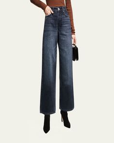 Rag amp; Bone "Andi" cropped wideleg jeans in dark wash denim    Approx. measurements: Size 26: 11 1/4 " rise, 27" inseam, 21 3/4" leg opening    Fivepocket style    High rise    Wideleg    Waisthugging fit    Cropped at the ankle    Button/zip fly; belt loops    fits true to size    100% cotton    Machine wash    Made in China Mid-rise Dark Wash Wide Leg Pants For Fall, Chic Dark Wash Wide Leg Jeans, Fall Dark Wash Wide-leg Jeans, Wide Leg Medium Wash Cropped Jeans For Fall, Dark Wash Cropped Wide Leg Pants With Five Pockets, Medium Wash Wide Leg Cropped Jeans For Fall, Fall Medium Wash Wide Leg Cropped Jeans, Fall Wide Leg Cropped Jeans In Medium Wash, Wide Leg Dark Wash Flare Jeans