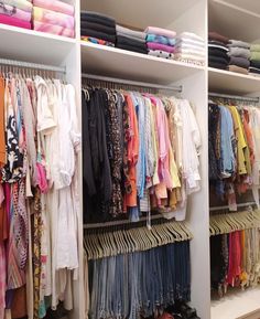 the closet is full of clothes and shoes for all kinds of people to choose from