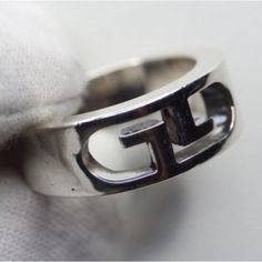 Gucci Unisex 925 Sterling Silver Ring, G Logo, Signature Vintage Sterling Piece From Gucci, Size 6. Very Little Scratching, Overall Excellent Condition! No Major Call Outs Weight: 8.6 Grams Size: 6 Metal: 925 Sterling Silver Brand: Gucci Also Available In Size 4 Also Excellent Condition! Modern Gucci Sterling Silver Jewelry, Timeless Silver Gucci Jewelry, Gucci Luxury Silver Rings, Luxury Silver Gucci Rings, Designer Silver Rings Hallmarked, Gucci Silver Ring With Polished Finish, Classic Gucci Sterling Silver Rings, Gucci White Gold Sterling Silver Ring, Gucci Sterling Silver Ring For Formal Occasions