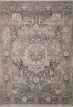 an area rug with many different colors and patterns on the carpet, including beiges, browns