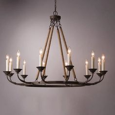 Candlely Vintage 12-Light Candelabra Wagon Wheel Chandelier with Flaxen Hemp Rope Faux Candle Chandelier, Stone Top Nightstand, Distressed Dining Table, Country House Ideas, Candelabra Chandelier, Wall Frame Set, Candelabra Chandeliers, Iron Chandelier, Wheel Chandelier