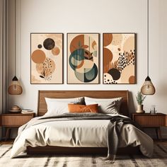 a bedroom with three paintings on the wall