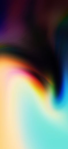 a blurry image of an orange, yellow and blue background with some black lines