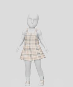 a small doll is standing in front of a white background and wearing a plaid dress