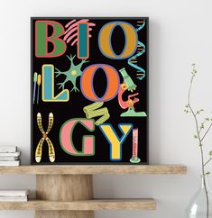 a black poster with the words bioloy gly on it next to some books