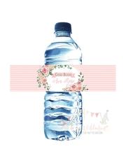 a water bottle with the name welcome baby ema on it's label in front of a pink checkered background