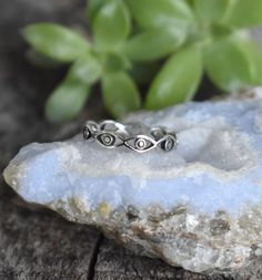 "Eternity Evil Eye Ring details: -Solid .925 sterling silver -4mm Ring Band Width -Comfortable and easily stackable! -Available in US sizes 4-10.5 with half sizes. Other rings shown here: https://www.etsy.com/shop/AWildViolet?ref=seller-platform-mcnav&section_id=13958646 Looking for a last minute or unique Christmas gift? Visit our \"READY TO SHIP\" section here, ships out in one business day https://www.etsy.com/shop/AWildViolet?section_id=23587515 Connect with us on Instagram @a_wild_violet fo Silver Bohemian Promise Jewelry, Spiritual Sterling Silver Jewelry With Halo Detail, Sterling Silver Spiritual Toe Midi Rings, Spiritual Sterling Silver Halo Jewelry, Witchy Rings Silver, Nickel-free Silver Witchy Jewelry, Sterling Silver Evil Eye Ring, Spiritual Evil Eye Ring Jewelry, Symbolic Eye-shaped Silver Jewelry