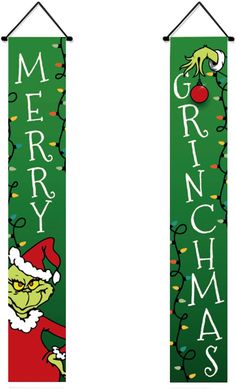 two green christmas banners hanging from hooks