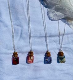 are you feeling whimsical?🌸 Regal? 👑 Angelic? 😇  Edgy? 🧛Or maybe you just want to feel fabulous! these tiny flower jar necklaces are made with real flowers and the insides are filled with resin to forever preserve them, as well as give a sparkling touch to these necklaces. Jar Necklace, Vampire Necklace, Necklace Princess, Flower Jar, Necklace Fairy, Fairy Jars, Flowers In Jars, Necklace Gothic, Gothic Vampire