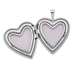 A beautiful 14 karat white gold heart shaped hinged locket with a .01 carat diamond in the center. It opens to hold 2 photos. Measuring 20 mm (.79"), with an attached bail and a rhodium finish. Chain sold separately. Vine Border, Photo Locket Necklace, Photo Pendant, Locket Charms, Photo Locket, Photo Heart, Heart Locket, Gold Enamel, Fine Jewelry Gift