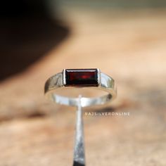 Natural Garnet Ring, Men's Ring, 925 Sterling Silver Ring, Handmade Ring, Engagement Ring, Gift For Him, Wedding Ring, Dainty Men's Jewelry  Metal: 925 Sterling Silver Gemstone : Garnet Stone Color : Red Stone Shape : Baguette Stone Setting: Bezel Benefits of wearing Garnet:- Those who can prosper by wearing the stone include people engaged in cosmetic trade, lottery sellers, share market dealers, professionals in film and television serial sectors and staff of chemical laboratories. People born Red Engagement Ring Man, Men’s Engagement Ring, Mens Promise Ring Red Garnet, Handmade Red Garnet Ring, Red Stone Ring For Men, Red Engagement Ring, Red Gem Stone Rings For Men, Garnet Wedding Rings, Garnet Wedding