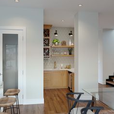 the kitchen is clean and ready to be used as a dining room or living room