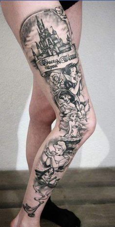 a woman's leg with tattoos on it and an image of a castle in the background