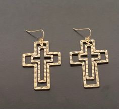 Stylish and inspirational, these cross earrings will add to any outfit. Hammered Metal Cut-Out Cross Size: 2.25"L Lead Compliant Goldtone or silvertone Earring Designs, Hammered Metal, Cross Earrings, Metal Earrings, Sheet Metal, Designer Earrings, Art Ideas, Cross Necklace, Silver Tone