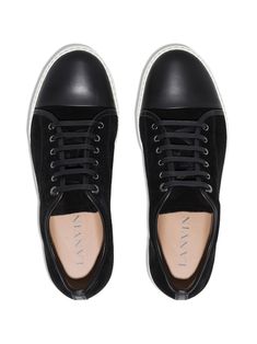 DBB1 low-top sneakers from Lanvin featuring black, calf leather, front lace-up fastening, round toe and flat rubber sole. | Lanvin DBB1 low-top sneakers Lanvin Sneakers, Lanvin Shoes, Low Top Sneakers, Flat Sneakers, High End Fashion, Superga Sneaker, Lanvin, Boys Shoes, Sneakers White