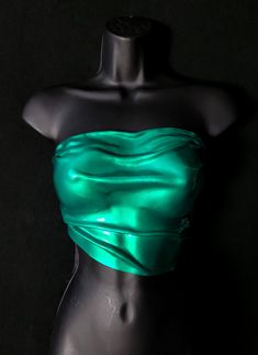 Design by Royal Dissension Meet Emerald Dreams this beautiful corset is a unique hand sculpted piece of wearable art. Be the center of attention while wearing this one of a kind armored corset. This unique piece is hand sculpted and finished to perfection with a strikingly dramatic wet gloss. Look like you've just been licked by the gods!  This armored style Corset attaches to you with corset ties in the back. The ties are black and have some elasticity which holds the corset close to your body Crystal Corset Shirt, Luxury Rhinestone Corset For Parties, Luxury Evening Corset With Rhinestones, Luxury Elegant Corset For Costume Party, Luxury Corset With Corset Back For Cocktail, Luxury Party Corset With Underwire, Luxury Corset With Corset Back For Parties, Luxury Party Corset With Adjustable Straps, Luxury Sequined Corset For Evening