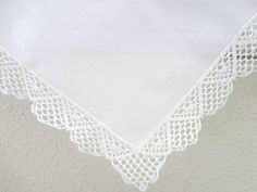 Lovely white lace handkerchief with sweet message for the mother of the bride. Handkerchief shown in main photo (no longer available), please select available style during checkout.Font style: scriptHandkerchief size: 11"x11"Handkerchief color shown: whiteEmbroidery color shown: white Elegant Lace Work Handkerchiefs Gift, Elegant White Handkerchiefs With Lace Work, Classic White Lace Handkerchiefs, Elegant White Lace Handkerchiefs, Classic White Lace Handkerchief, Classic White Lace Work Handkerchiefs, Elegant White Handkerchiefs With Crochet Lace, Classic Handkerchiefs With Lace Trim As Gift, White Lace Handkerchiefs With Embroidery