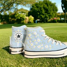 Custom Chucks are your canvas for self-expression. Now you can show off your style in a mix of canvas and denim, topped with summer-inspired embroidered graphics, like butterflies, cactuses, and bright poppies. - High-quality canvas material is thick, durable, and light to help keep the shoe in shape - High-neck design for personality and comfort on the go. - Higher sole in ivory color and glossy finish for easy access. Easy to clean - Ortholite footbed helps you walk smoothly and gently - The logo on the back of the shoe has been renovated in white text on a black background with vintage font - Piercing and side eyelets are made from high-grade rust-resistant metal. With dreamy florals and winding stems, this beautiful pattern will add a whole new dimension to your plain converse. You are Cool Shoes Converse, Cute Converse Designs, Plain Converse, Christmas Converse, Fun Converse, Custom Chucks, Summer Converse, Embroidered Shoes Converse, Embroidery Daisy