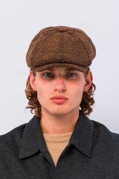 Introducing our Newsboy Cap in Brown with Black Stripes, a classic and sophisticated accessory that adds a touch of timeless charm to your ensemble. Crafted from high-quality materials, this cap features a rich brown hue complemented by bold black stripes for a stylish yet understated look. The structured design and paneled construction give this cap a refined silhouette, while the brim adds a hint of vintage appeal. The contrast between the brown base and black stripes creates a striking visual contrast, making it a versatile accessory that pairs well with a variety of outfits. Whether you're running errands around town or enjoying a leisurely day out, our Newsboy Cap in Brown with Black Stripes is the perfect finishing touch to your ensemble. Pair it with jeans and a sweater for a casual Brown Wool Visor Hat, Brown Retro Beret For Fall, Retro Brown Beret For Fall, Classic Brown Baseball Cap With Curved Brim, Casual Brown Brimmed Beret, Classic Brown Flat Cap, Brown Brimmed Baseball Cap, Classic Brown Baseball Cap For Outdoor, Brown Flat Cap, One Size Fits Most