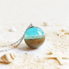 Ocean Necklace Beach Sand Necklace Blue Aqua Crystal - Etsy Water Necklace, Sand Jewelry, Ocean Theme Jewelry, Sand Necklace, Sphere Necklace, Dandelion Necklace, Jewelry Ocean, Ocean Gifts, Beachy Jewelry