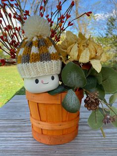 Tiny hand knit hat fits cute little marshmallow mugs. Looks great displayed with Rae Dunn items and on tiered trays. Listing only includes hat.  Custom orders welcome. Orders ship within two weeks from date of purchase. Cute White Crochet Hat For Gift, Cute White Crochet Hat For Gifts, Cute White Crochet Hat As Gift, Hand Knitted White Hat Gift, White Hand Knitted Hat Gift, White Yarn Crochet Hat For Gift, White Crochet Hat As A Gift, White Hand Knitted Hat As Gift, White Yarn Crochet Hat As Gift