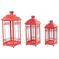 three red metal lanterns sitting next to each other