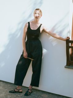 The All Day Pant — a pull-on style with an elastic waist, added drawstring for cinching, roomy balloon leg, mid-rise fit, and side seam pockets. Designed in our 100% Organic Cotton Poplin, these are the easiest pants you'll wear all day, every day, on rotation. Black Summer Pants For Daywear, Black Drawstring Bottoms For Everyday, Summer Pants With Drawstring For Everyday Wear, Spring Parachute Pants With Elastic Waistband For Everyday, Summer Parachute Pants With Elastic Waistband And Tapered Leg, Black Pants For Spring Daywear, Black Trousers For Daywear, Black Tapered Leg Bottoms For Daywear, Everyday Spring Black Pants