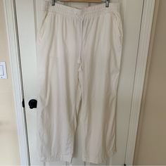 Flowy And Lightweight Linen Blend Pants By Lane Bryant Women's Size 16 Front Pockets Back Pockets Linen Blend White Color Wide Leg Elastic Waist With Drawstring Approximate Measurements While Laying Flat Inseam 30" Rise 14" Smoke Free Home Pet Friendly New With Tags Make Me An Offer! Don’t Forget To Bundle. 10% Off 2 Items Or More! White Stretch Bottoms For Relaxation, Spring Relaxation Bottoms With Drawstring, Spring Relaxation Drawstring Bottoms, White Stretch Pants For Lounging, White Straight Pants For Lounging, White Wide Leg Pants For Relaxation, Wide Leg White Pants For Relaxation, White Stretch Pants For Relaxation, Casual White Pants For Relaxation