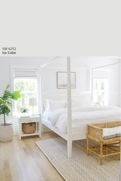 a bedroom with white walls and wood floors is featured in this postcard from the interior design magazine