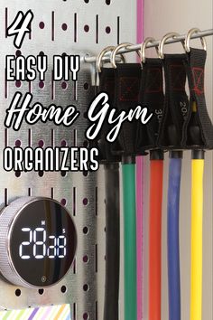 Home gym wall Organization Home Gym Wall Organizer, Creative Home Gym Storage, Peloton Garage Ideas, Gym Wall Organization Ideas, Exercise Equipment Wall Storage, Home Gym Accessories Storage, Workout Storage Ideas, Fitness Storage Ideas, Workout Equipment Storage Ideas