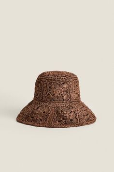 a brown hat on a white background