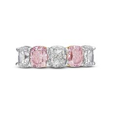 three stone ring with pink and white diamonds