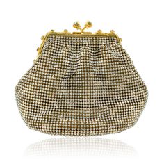 GOLD SOFT MESH CLUTCH W/ SWAROVSKI CRYSTALS  Clear Swarovski Crystals adorn this ravishing gold evening clutch.  Chain Shoulder Strap Included.   Genuine Swarovski Crystals Hand Set Crystals Clear Stones Height: 4" Width: 6 1/2" Beautiful Lines, Clear Stone, Evening Clutch, Drawstring Backpack, Swarovski Crystals, Shoulder Strap, Mesh, Crystals