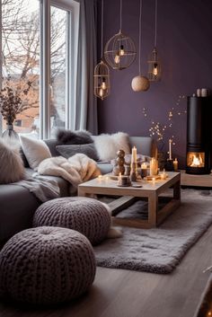 a living room filled with furniture and candles