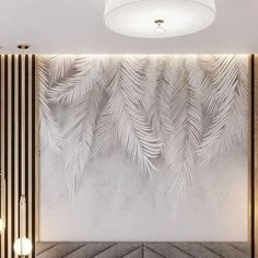 the interior of a modern hotel with palm leaves on the wall