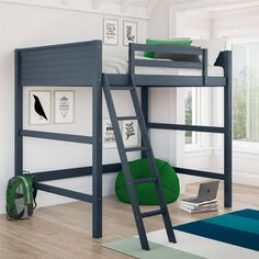 there is a bunk bed with a ladder on the bottom and a green bean bag underneath it