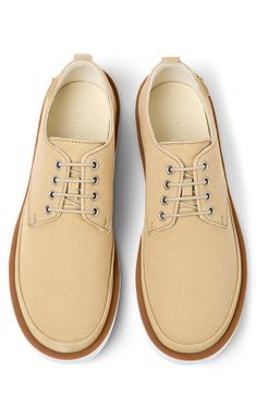 A lightweight, flexible outsole enhances the everyday appeal of a lace-up sneaker with a clean, classic profile. OrthoLite® Recycled™ footbed Textile and leather upper and lining/synthetic sole Imported Classic Profile, Sneaker Men, Nordstrom Rack, Leather Upper, Nordstrom, Lace Up, Sneakers, Lace, Leather