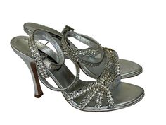 Claudio Milano Leather Sandal Silver Crystal Size 38 Italy (US 7.5) Retail $719 Store display Silver leather with silver crystal, elegant sandal for your evening/ party Heel about 4" True to size Sparkling Heels For Formal Evening Events, Formal Silver Sandals With Rhinestones, Elegant Sparkling Sandals For Cocktail, Glamorous Sparkling Formal Sandals, Sparkling Open Heel Sandals For Formal Occasions, Silver Embellished Sandals For Formal Occasions, Sparkling Silver Sandals For Cocktail, Formal Silver Embellished Sandals, Elegant Sparkling Sandals For Formal Occasions